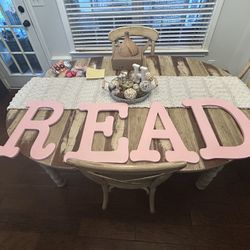 Pink Letters Spelling “READ”