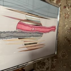 Three Paintings In Frames