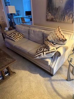 🛋️ Beautiful neutral beige/tan upholstered sofa with decorative nailhead trim. $150