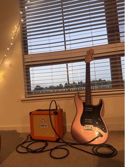 Electric Guitar with Orange amp