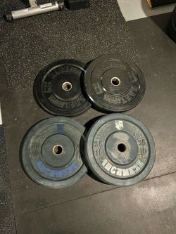 Two pairs of Bumper Plates 25s & 35s
