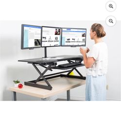 Rocelco 46” height-adjustable sit-stand desk converter with gas piston assist system for smooth heig