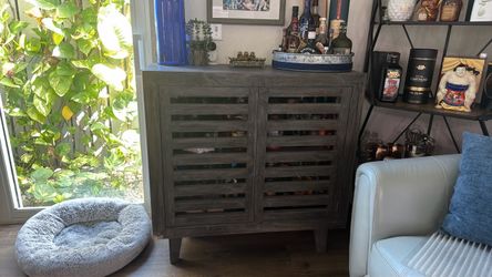 Gray Wood Cabinet with Louvered Doors
