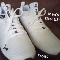 BLACK AND WHITE PUMA SHOES