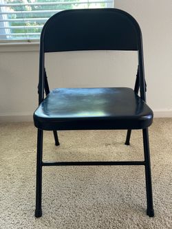 Black Folding Chair – Good Condition
