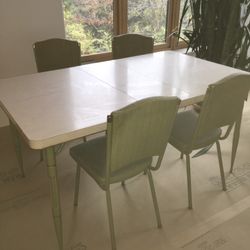 Vintage Howell Formica Table with Extra Leaf and Four Chair Dinette Set