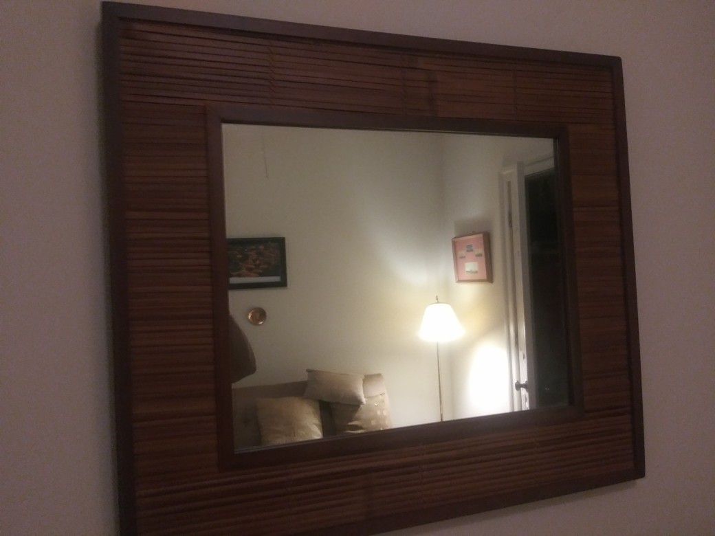 Brown panelled mirror