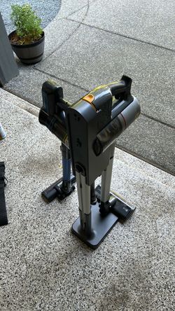 Two working vacuum cleaners