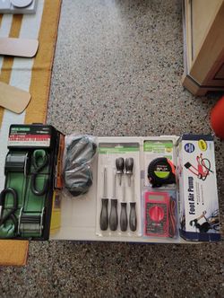 Cam Buckle Tie Downs,2 Welding Goggles,Mes. Tape,Screw Drivers,Foot Pump