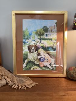 Large St. Bernard sleeping girl fountain art picture.