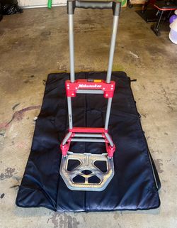 The Milwaukee 150 lb. • Convertible Fold-Up Steel Hand Truck