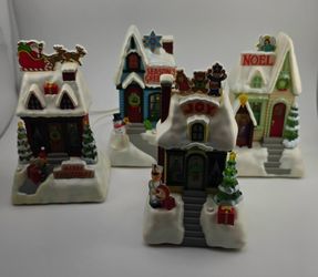 Hallmark 2009 Caroling Cottages Musical Tabletop Decoration - Set of 4