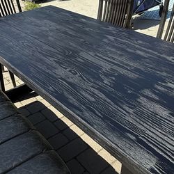 Dining table, bench, chairs, and mirror