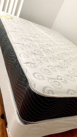 New full mattress and box spring 2 pc bed frame is not included