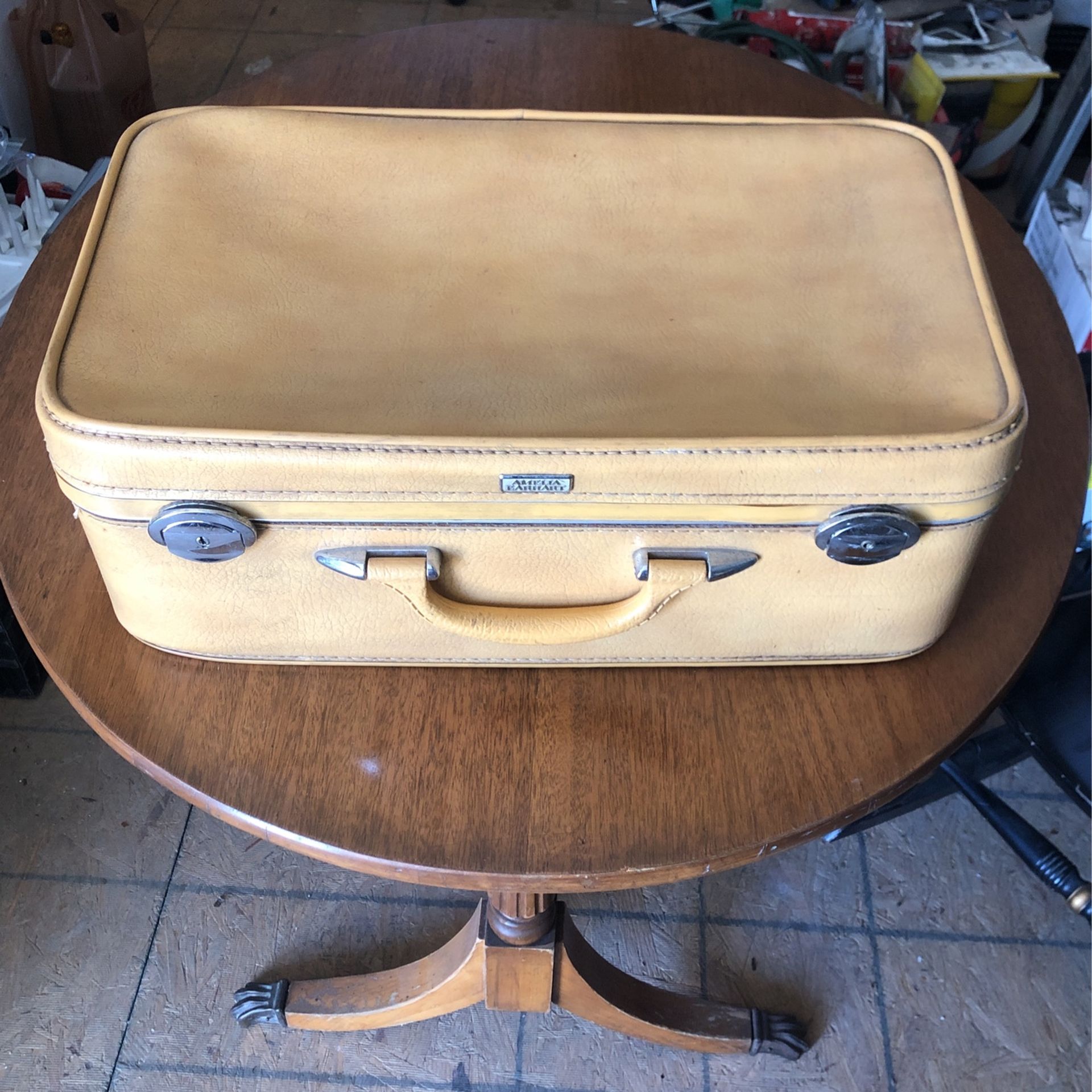 Vintage yellow Amelia Earhart suitcase
