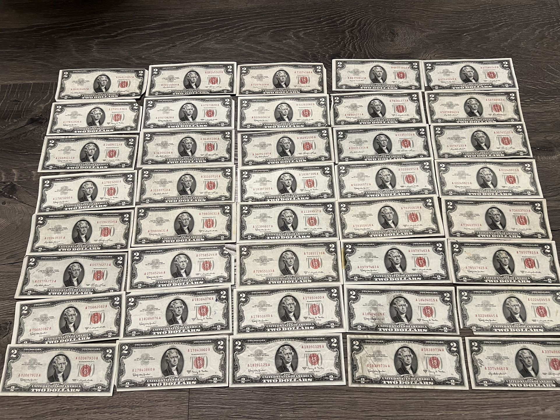 Rare lot of 90 $2 dollar bills red seal currency notes.