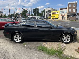 Super Clean Blk Charger Only 3500Obo Trades And Cash Welcome