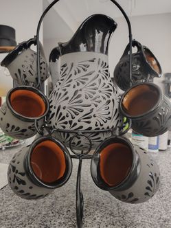 Clay mug and pitcher set