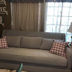 Couch two end tables 2 lamps two lavender and white pillows all brand new items hardly ever used paid 2000 selling all of it for 600