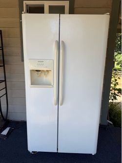 White side-by-side refrigerator with ice/water dispenser $50 OBO