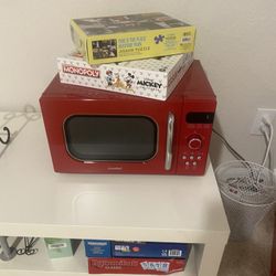 Mini freezer and microwave, lightly used.