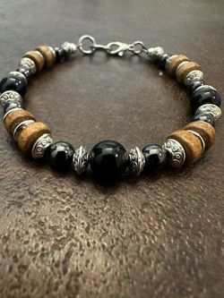 Elegant Beaded Bracelet with Silver Details