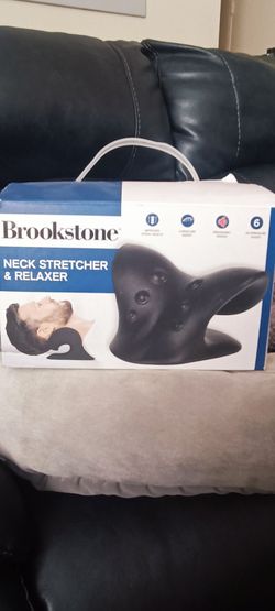New. Open box Brookstone Neck Stretcher & Relaxer