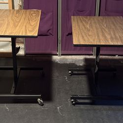 2 Rolling adjustable-height tables height 20”–31”