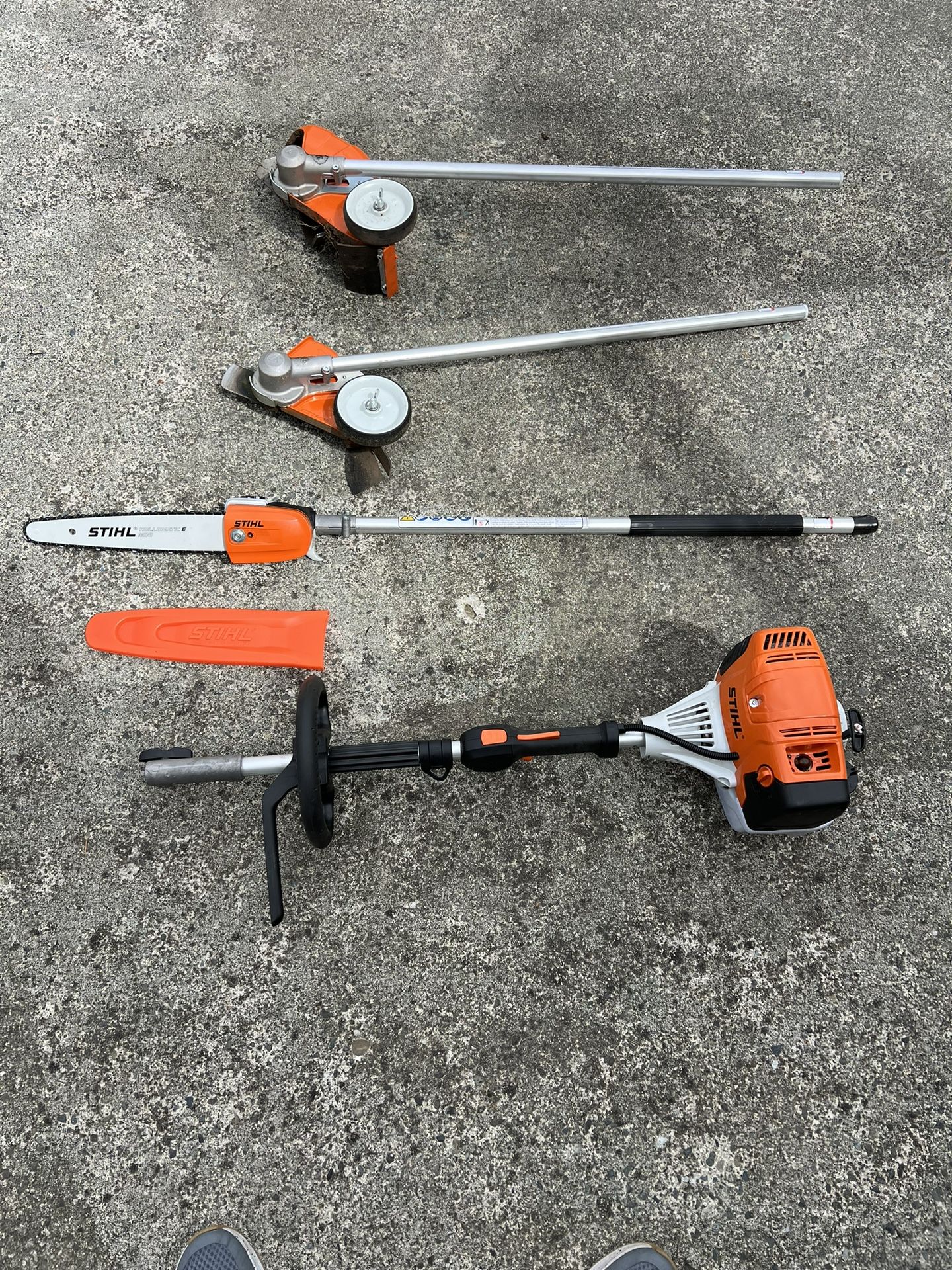 Stihl Kombi System KM 91 motor, edger, bed redefiner and pole saw for