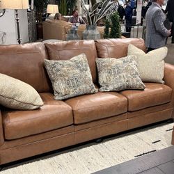 Carianna Caramel Sofa
Ashley Furniture$10 Down Payment And Financing Available