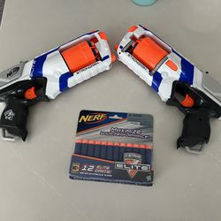 Two Nerf Guns And Bullets 
