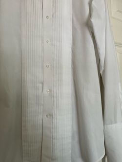 White Tuxedo Dress Shirt with Pleated Bib there is A Three Pieces shirt and Bo tie set all of them are for $35total