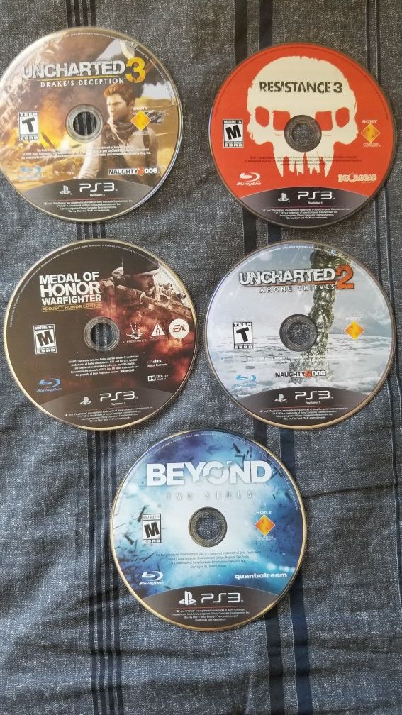 PS3 slim w/2 controllers/accessories/9 games