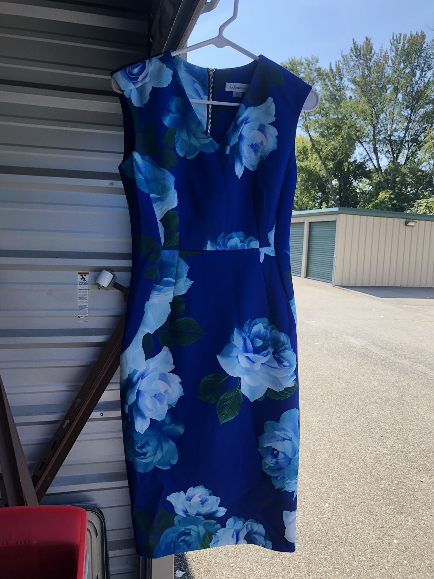 Calvin Klein blue floral sleeveless dress, zip up in back, lady’s size 4