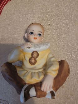 Vintage Harlequin clown music box collectible by Mann