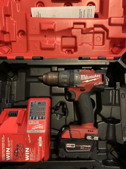 Milwaukee hammer drill (used) with 4.0 battery and brand new charger. $140