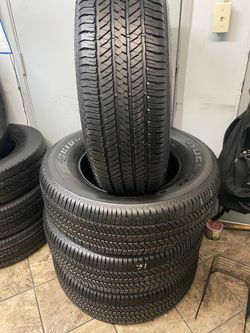SET 255/70/18 BRIDGESTONE DULER SEMI NEW 95%TREAD LIFE 300 PRICE INCLUDE PROFESSIONAL INSTALLATION AND TAX