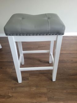 White and gray bar stools