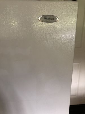 Photo Whirlpool 21 cubic foot refrigerator