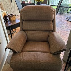 RECLINER CHAIR X SWIVELS X ROCK  $350.00 Like N BRAND NEW 