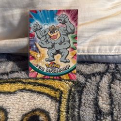 Machamp #68 Pokémon Topps TV Animation Edition trading card. 