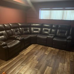 Large Brown Faux Leather Reclining Sectional with Cup Holders