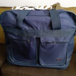 Large travel bag 23 in Long by 19 high 5 Rolling Wheels
