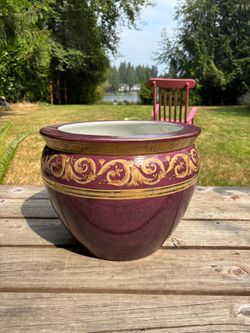 Oriental ceramic fish bowl planter