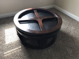 Beautiful Round coffee table with pull out chairs.