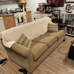 Three Seater Pullout Couch And Pillows