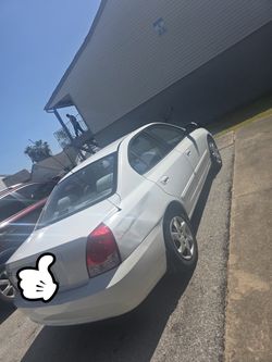 White Nissan Altima Sedan