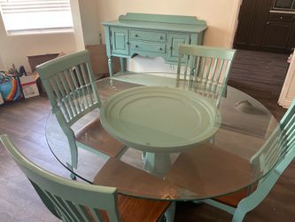 Dining room table and chairs with hutch