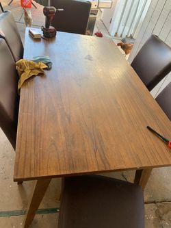 Wooden And Leather Dining Room Set