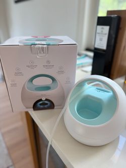 Used Electric Breast Milk Pump baby feeding